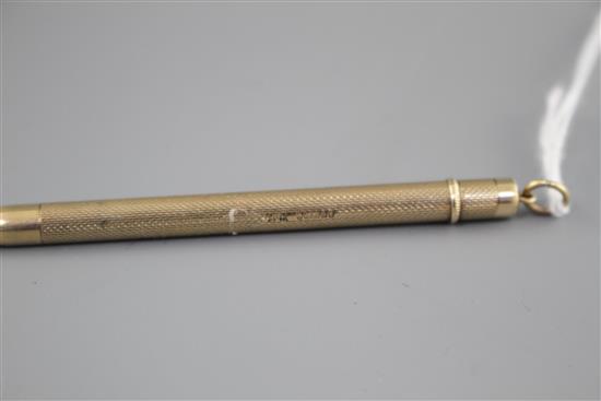 A modern engine turned 9ct gold propelling pencil, S.J.Rose & Son, Birmingham, 1960, 87mm, gross weight 10.4 grams.